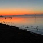 Zachód słońca z pomostem nad Jeziorem Otmuchowskim